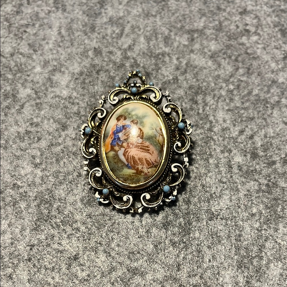 Gold Fragonard Courting Couple Oval Brooch With Intricate Design
